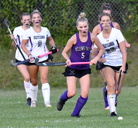 Bellows Falls forward Emma Bazin (5), seen here being pursued by Brattleboro’s Emma Gragen (9) and Rachel White (25), scored four goals as the Terriers won, 9-1, in field hockey action on Sept. 14 at Sawyer Field.