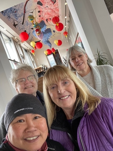 With a Chinese dragon in the background, Chan and her friends head to The Moth event. From left: Becky Chan, Fran Lynggaard Hansen, Ann Turner Tripp, and Pam Lane.