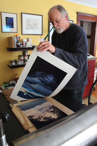 William Hays pulls a woodcut print in his Turners Falls, Massachusetts studio. He will be attending the opening reception for his prints at Gallery In The Woods in Brattleboro during Gallery Walk on June 2.