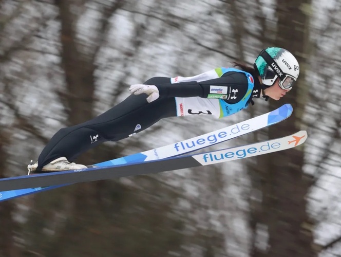 Slovenian flyer Nejka Zupančič takes to the air over the 2024 Presidents Day weekend at Brattleboro’s Harris Hill Ski Jump.