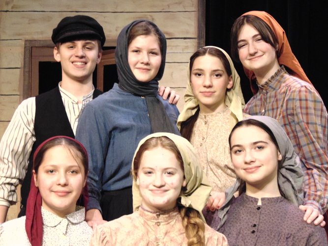 The cast of the BUHS production of &#8220;Fiddler on the Roof,&#8221; Back row, from left: Griffin Woodruff as Tevye, Genny Schneski as Golde, Abby Sharff as Tzeitel, Lila Armour-Jones as Hodel. Front row, from left: Soma Lever as Bielke, Lizzie Elkins as Shprintze, and Isabella May as Chav.