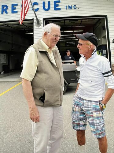 Verne Bristol, left, talks with Chuck Cummings during an open house at Rescue Inc. Bristol, who along with Cummings was one of the founders of Rescue Inc., died on Aug. 23 at the age of 91.