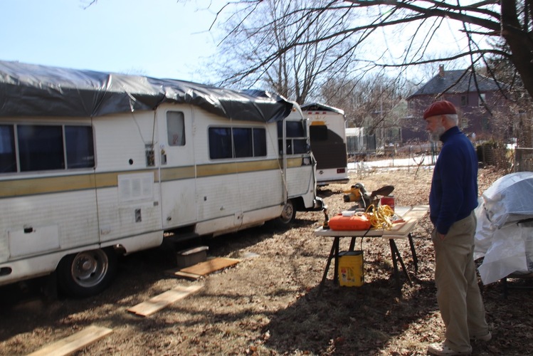 Kurt Daims with two of the RVs on his property in February 2023.