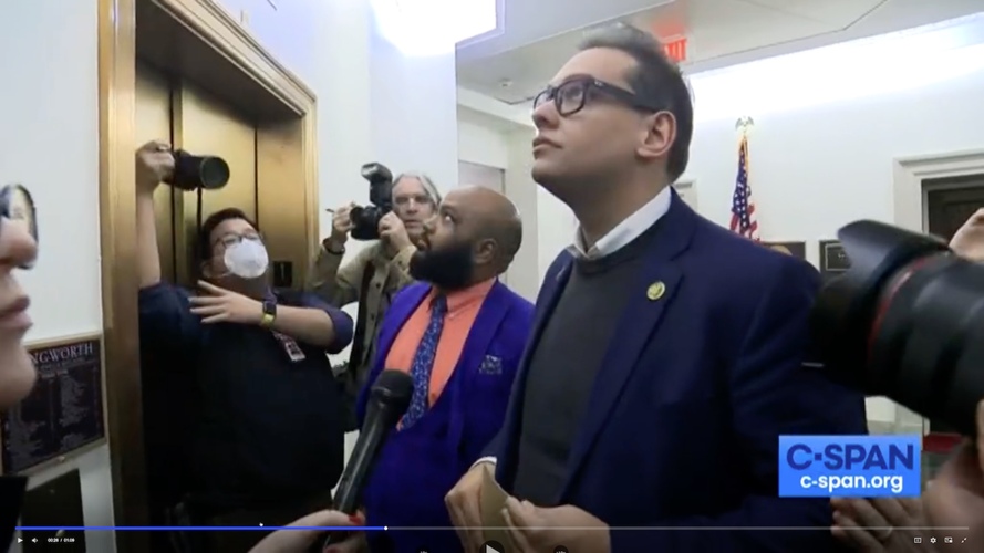 U.S. Rep. George Santos (R-N.Y.) reacts to a reporter’s question on Jan. 31 after he stepped down from his committee assignments amid fabrications .