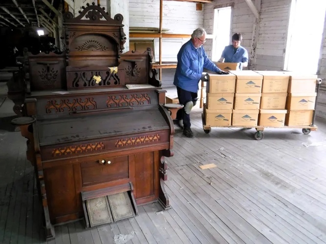 Archivists remove records from Brattleboro’s former Estey Organ Co., this year for relocation to the national Organ Historical Society near Philadelphia, Pennsylvania.