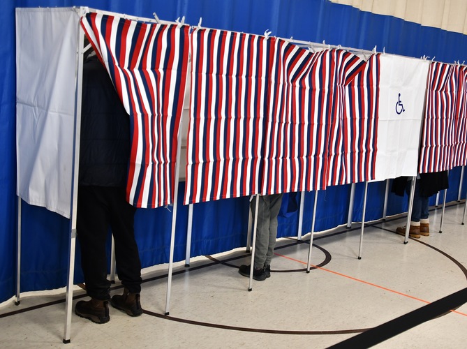 Voters cast their ballots at last year’s Putney Town Meeting.
