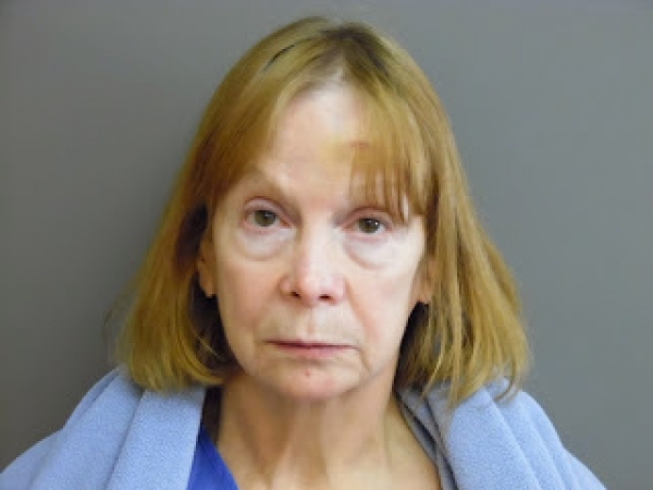 Townshend woman accused in fatal shooting of father and son