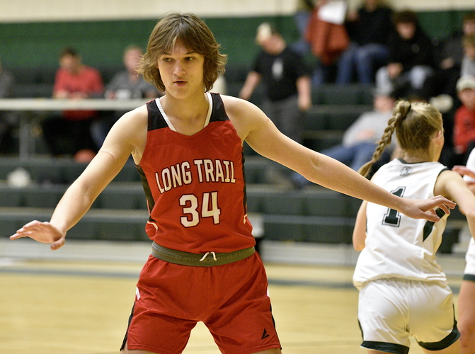 Rose Johnson, a senior at Long Trail School in Dorset, has played varsity girls’ basketball for the past two seasons but her presence on the team as a transgender athlete has prompted a federal lawsuit. She is seen here playing against Leland & Gray in the Green Mountain Holiday Tournament in December.