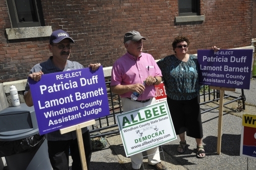 During the 2014 campaign, assistant judge candidates Lamont Barnett, left, and Patricia Duff, right, flank state Senate candidate Roger Allbee. 