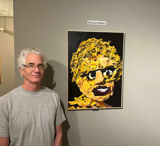 Artist Richard Heller with one of the featured works (untitled, 20 in. x 30 in.) in “Paintings of Paintings” at Gallery in the Woods in Brattleboro. 