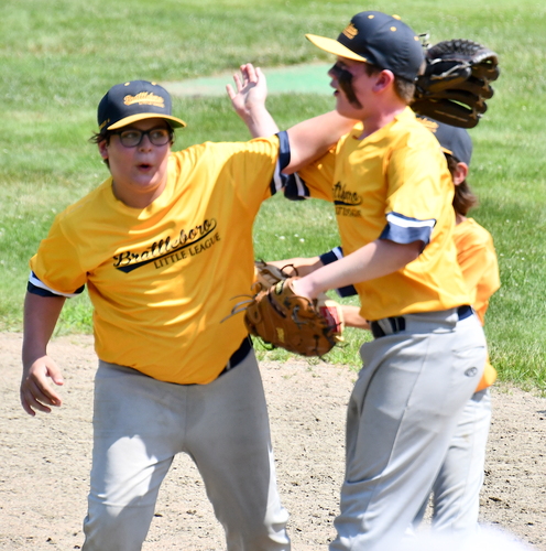 Brattleboro second baseman Axton Crowley, left, and first baseman Shaun Emery-Greene celebrated after they combined to get the final out in a 9-8 win over Rutland County in a Little League playoff game on July 8.