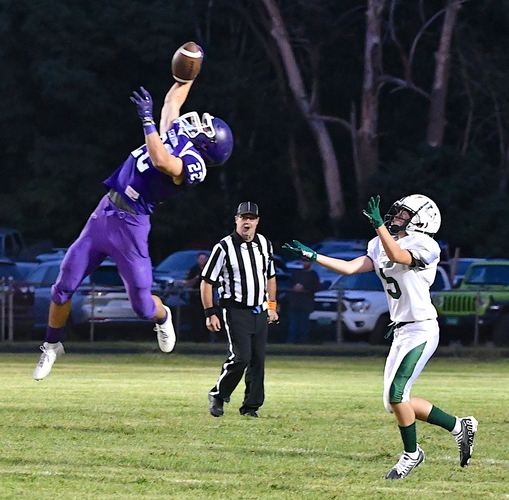 Bellows Falls defensive back Walker James, left, intercepts a pass intended for Springfield receiver Dylan Priestley during the second quarter of their Sept. 1 football game at Hadley Field in Westminster. Bellows Falls won their season opener, 34-0.