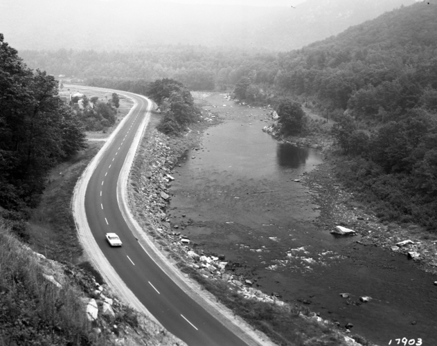 This black and white photograph looks east over a newly-completed section of Vermont Route 30 between Brattleboro and Dummerston.