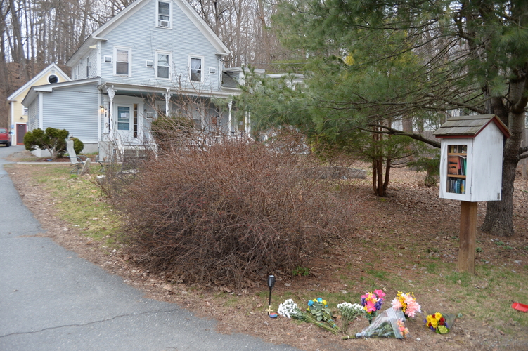 Bouquets of flowers left at the foot of the driveway at Morningside House in Brattleboro.