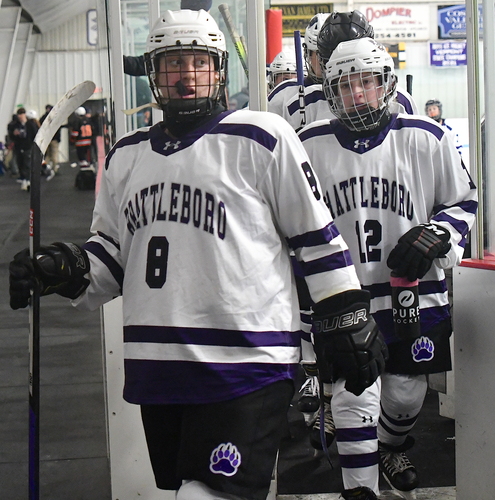 Brattleboro forwards Emily LaClair (8) and Avery Hiner (12) head to the locker room at the end of the second period of their hockey game against Middlebury on Jan. 10 at Withington Rink. Middlebury scored seven goals in the second period on the way to a 10-0 victory.