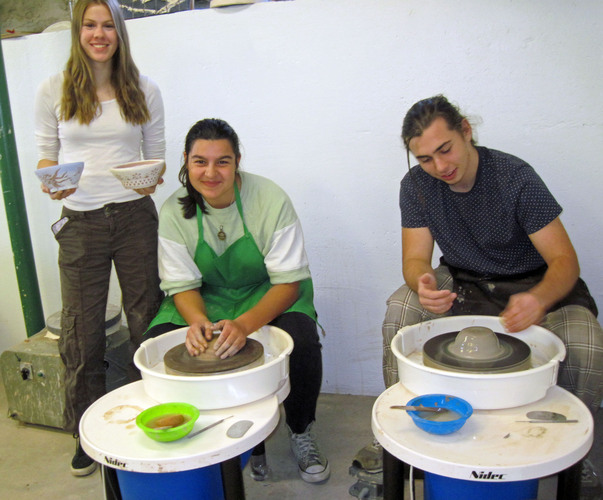 Vermont Academy students in Ryan Burch’s pottery classes create bowls for the Nov. 19 Our Place Empty Bowl fundraiser. From left, Sydney Palmiotti of Walpole, New Hampshire, and Ana Hernandez and Oliver Fischetti of Rockingham.