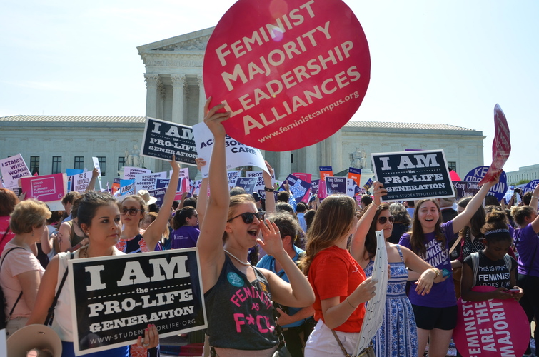 Protestors on both sides of the abortion divide swarmed the grounds of the Supreme Court as justices prepared to weigh in on the <i>Whole Woman’s Health v. Hellerstedt</i> Texas abortion case in 2016.