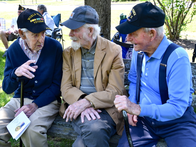 From left, World War II veterans George Stone Sr., Walter Schwarz, and Richard Hamilton chat before the start of the annual Memorial Day service on the Brattleboro Common on May 29.