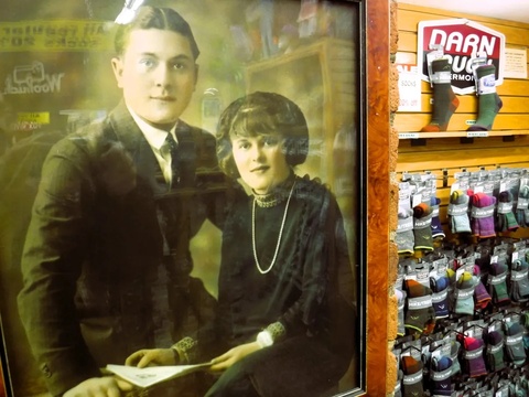 A 1927 photo of Sam’s Outdoor Outfitters founder Sam Borofsky and his wife, Yetta, looks over the downtown Brattleboro store.