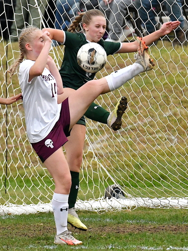 Soccer is definitely a contact sport, as demonstrated in this scene in front of the Leland & Gray goal in their Division IV girls’ soccer playoff game against Proctor on Oct. 26.