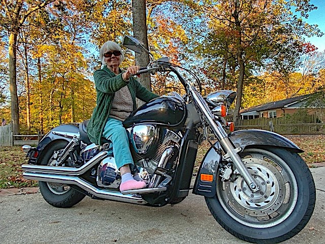 Thelma Sharlow of Brattleboro, 94, poses on her grandson’s motorcycle.